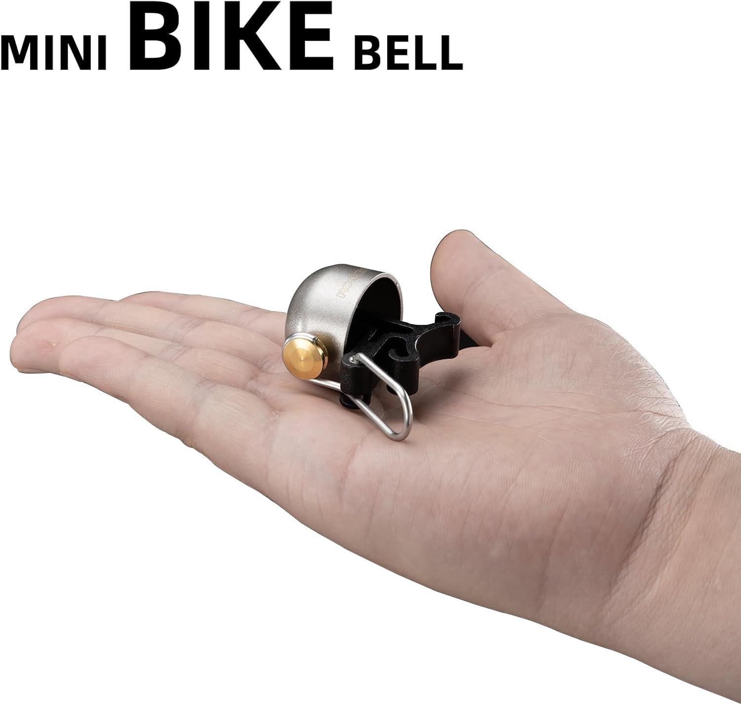 imageROCKBROS Bike Bell Classic Bicycle BellLoud Sound 100dB Bike Bells for Adults Kids Fit for 087134in Bicycle HandlebarsRoad Mountain Bike AccessoriesTitanium